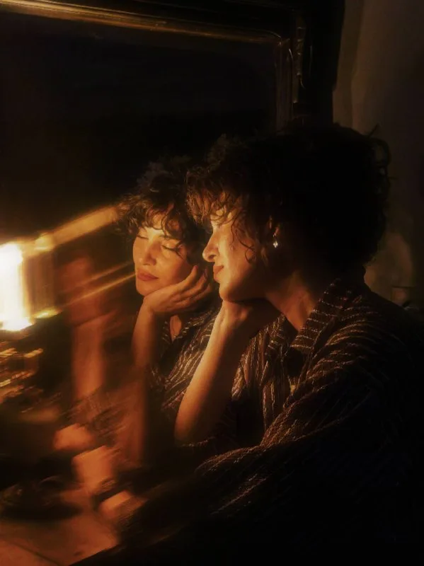 Ultra-cinematic intimate portrait based entirely on the uploaded reference image. Use the uploaded photo as the